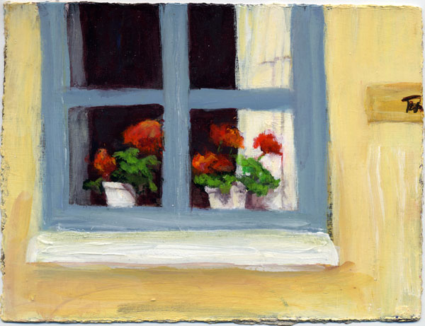 geranium in window with sign on right