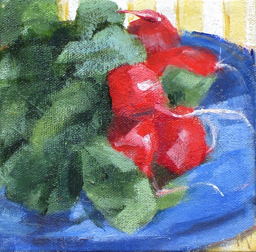 red radishes on blue plate yellow stripes