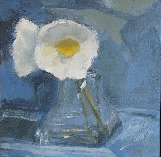 Two white poppies in glass vase