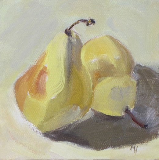 two pears one standing one lying down