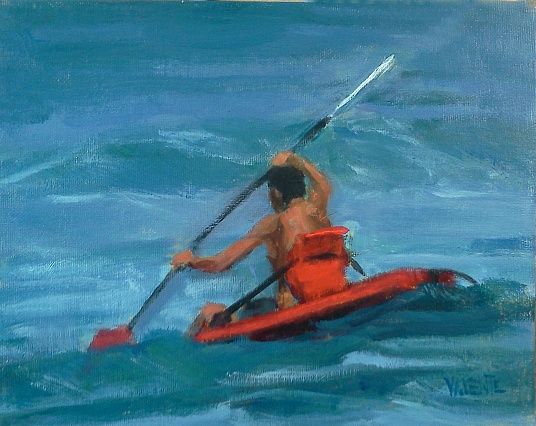 man in red kayak at sea