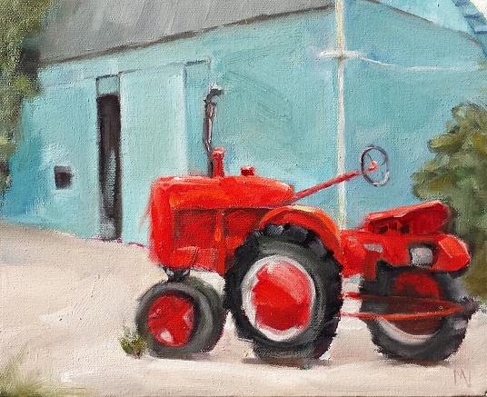old red tractor with blue barn