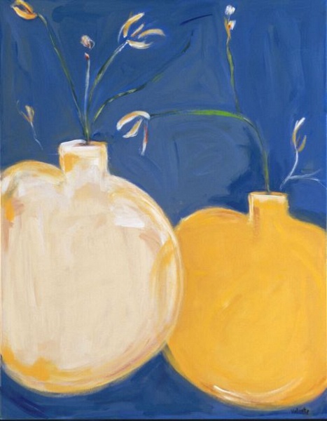 white and ochre vases on blue