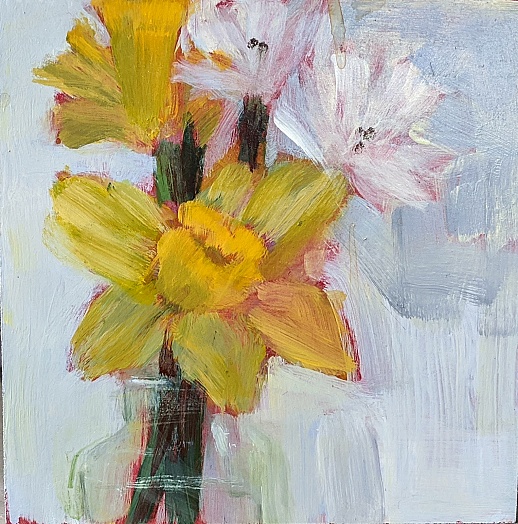 two yellow daffodils with perky white flowers