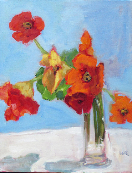 garden nasturtiums in clear vase