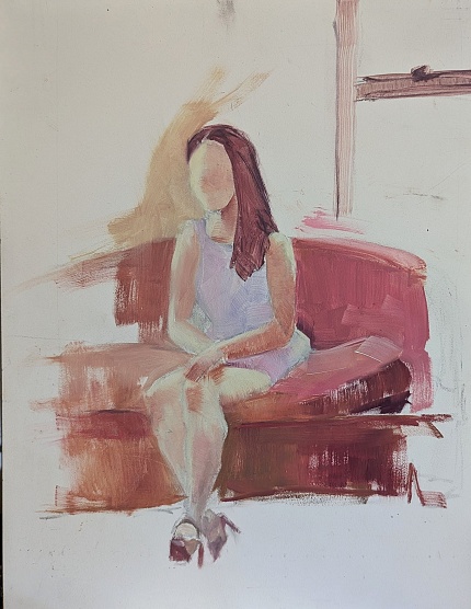 woman sitting on sofa