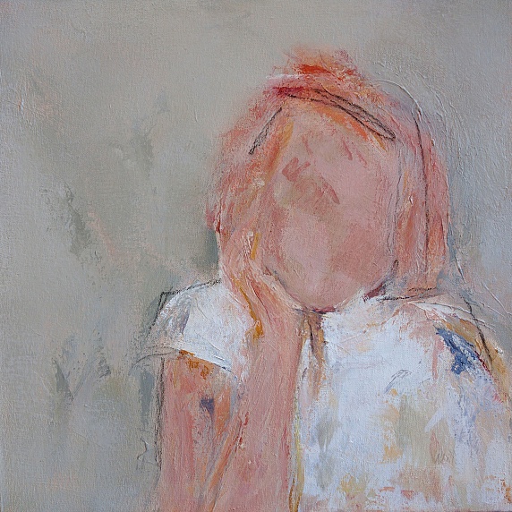 Woman resting chin on hand
