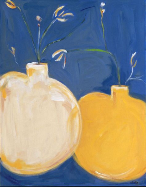 white and ochre vases on blue